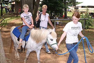Treat your kids to a special pony ride in Piney Woods at Bishop's Pumpkin Farm in Wheatland, California